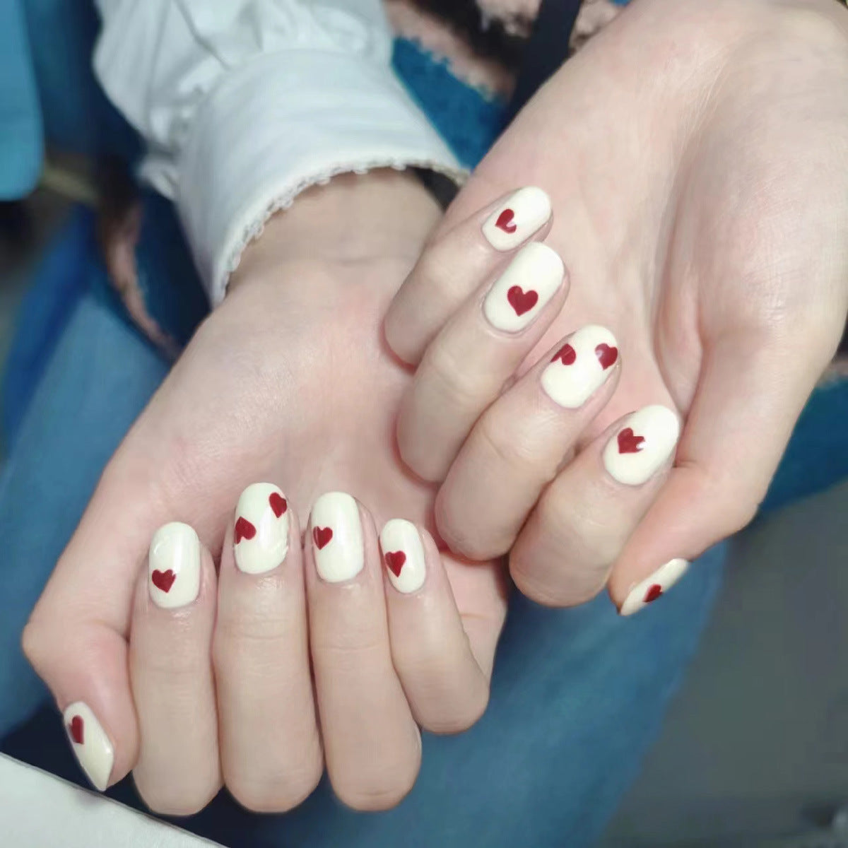 Romantic Heart Theme Medium Oval Ivory Press On Nail Set with Red Heart Design for Effortless Style