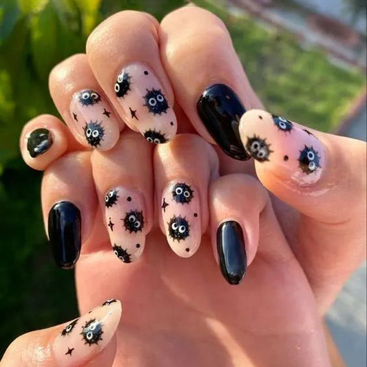 Spooky Vibes Medium Oval Black and Beige Press On Nail Set with Unique Graphic Design
