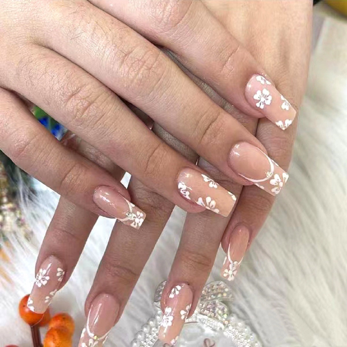 Floral Elegance Long Coffin Press On Nail Set in Blush Pink with Hand-Painted White Flower Designs