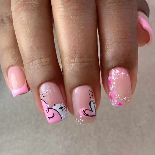 Charming Whimsical Short Square Pink Pastel Nail Set with Dreamy Glitter Accents