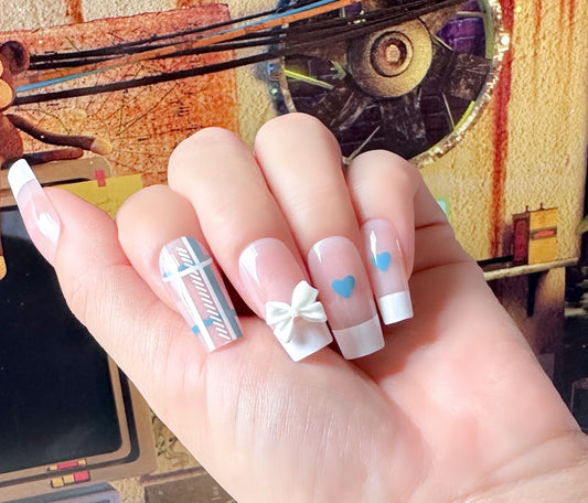 Whimsical Winter Wonderland Long Coffin White and Blue Press On Nail Set with Cute Bow and Heart Designs