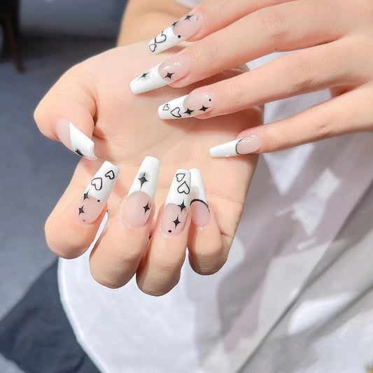 Celestial Love Long Coffin White Nails with Heart and Star Designs for Glamorous Nail Art Style