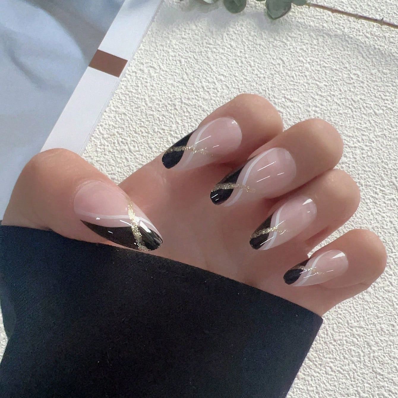 Elegant Noir Glamour Long Almond Black and Beige Press On Nail Set with Gold Accent Stripes