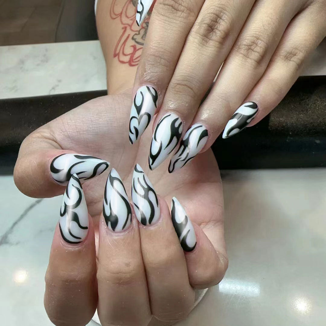 Flame Inspired Extra Long Stiletto Press On Nail Set in Black and White with Unique Pattern Design