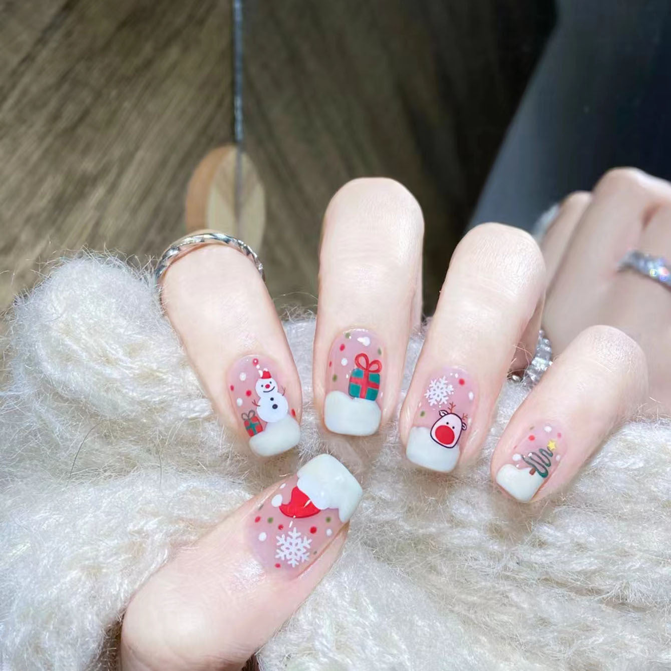 Festive Winter Wonderland Medium Square Pink Nail Set with Cute Holiday Designs and Glitter Accents