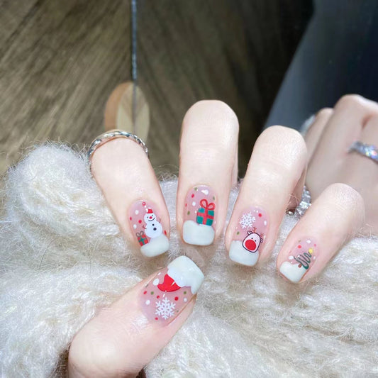 Festive Winter Wonderland Medium Square Pink Nail Set with Cute Holiday Designs and Glitter Accents