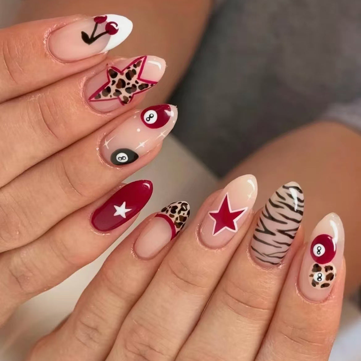 Chic Game Night Long Almond Red and Natural with Fun Star and Animal Print Accents Press On Nail Set