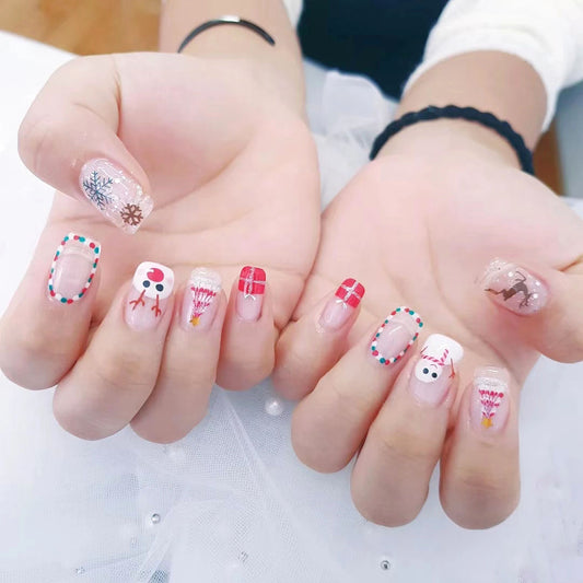 Winter Wonderland Glittery Short Square Press-On Nail Set in Pastel Pink with Festive Themed Designs