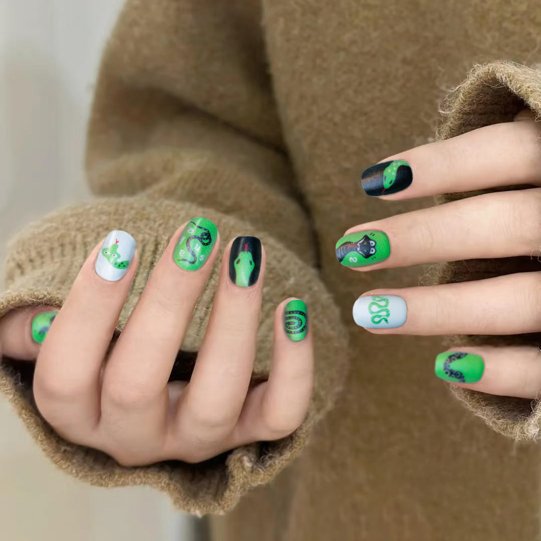 Serpent Inspired Short Squoval Green Press On Nail Set with Unique Snake and Frog Design