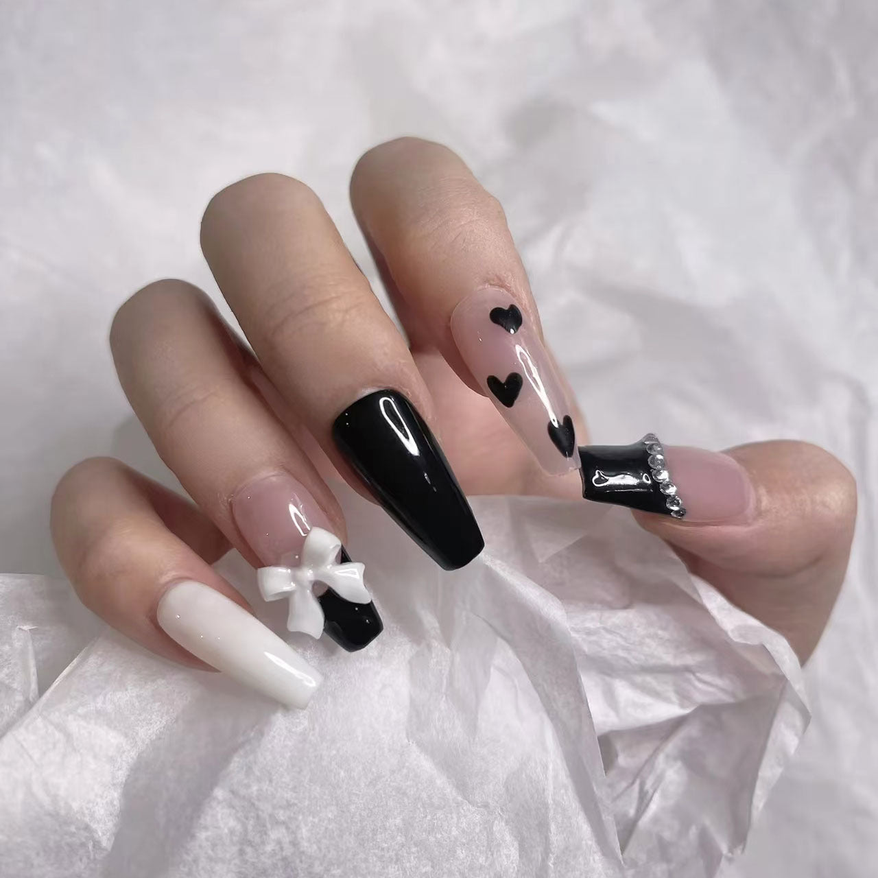 Whimsical Charm Long Length Coffin Shape Black and White Color with Heart and Bow Details Press On Nail Set