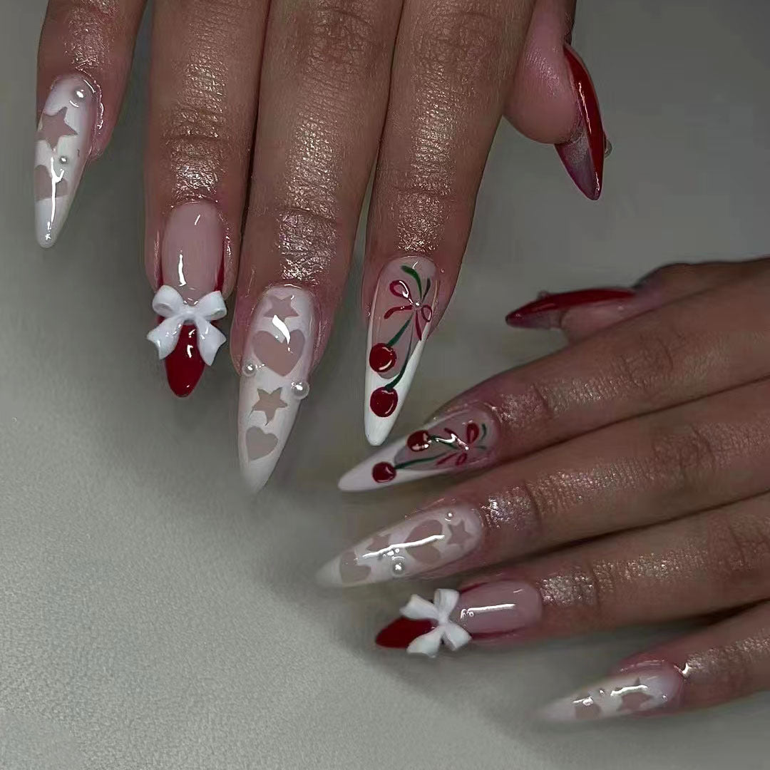 Cherry Blossom Romance Long Stiletto Red and White Nail Set Featuring Unique Bow and Floral Designs