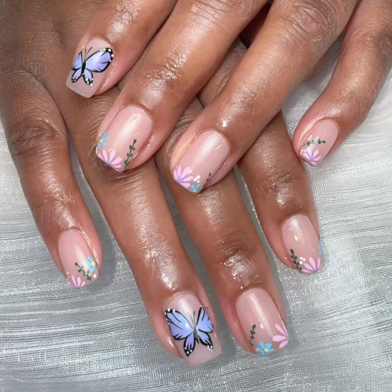Whimsical Garden Inspired Short Square Soft Pink Press On Nail Set with Charming Butterfly and Floral Accents