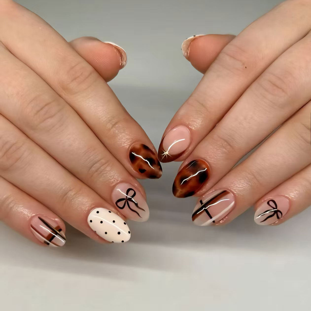 Chic Elegance Medium Almond Brown and Beige Press On Nail Set with Unique Bow and Line Design