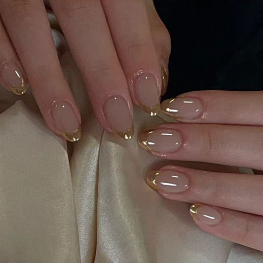 Elegant Glow Ombre Medium Oval Beige Press On Nails with Radiant Gold Tips