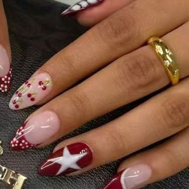 Festive Chic Long Almond Red and Pink Press On Nail Set with Unique Star Design and Dotted Accents