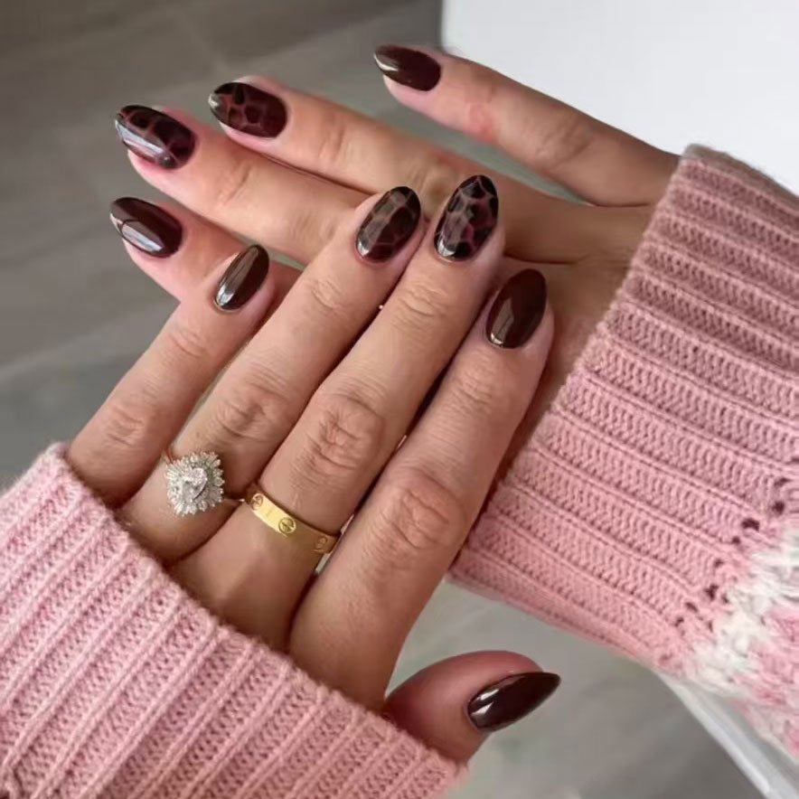 Glamorous Jungle Inspired Medium Oval Shaped Deep Brown Press on Nail Set with Captivating Animal Print Accents