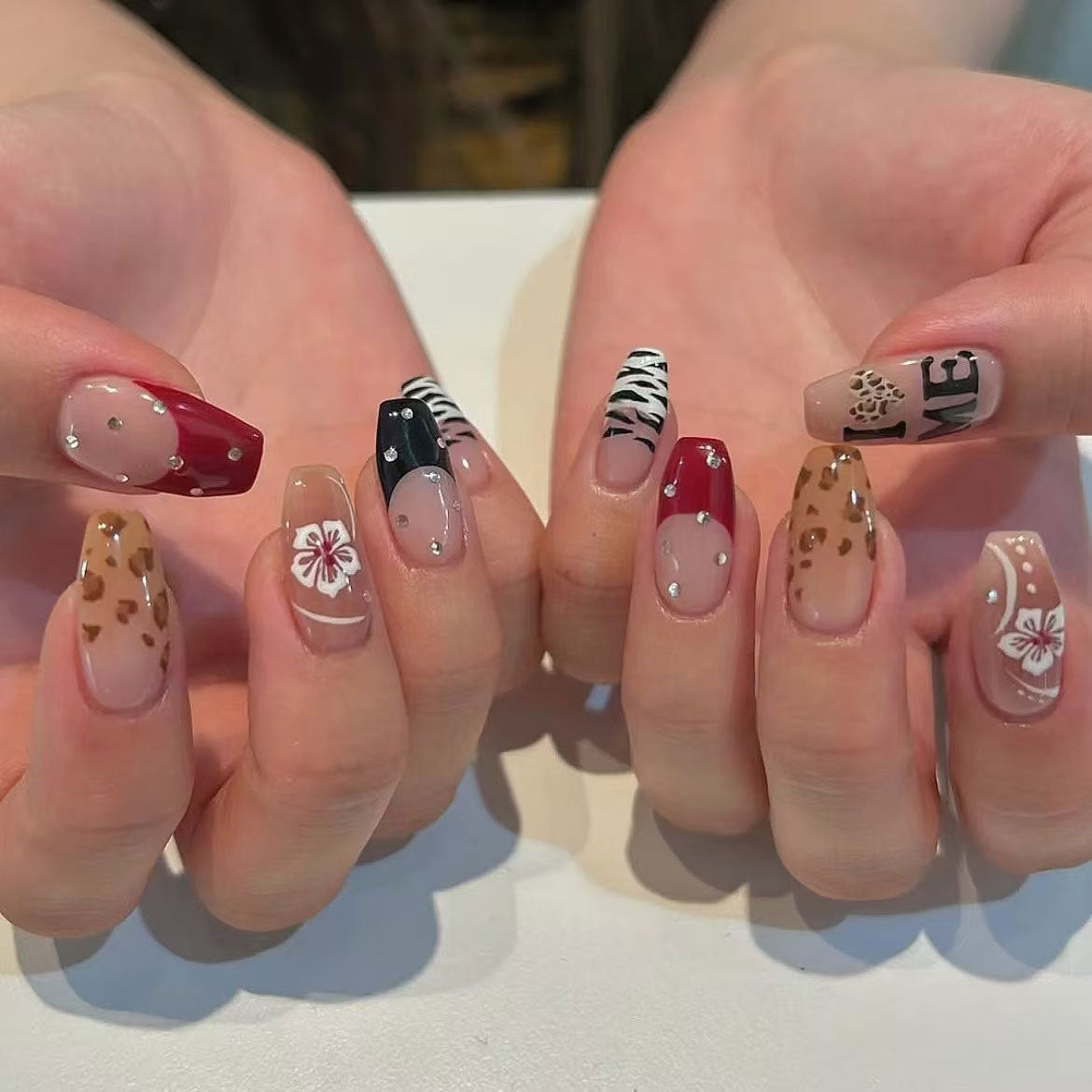 Tropical Vibes Medium Coffin Multicolored Press on Nail Set with Unique Glitter and Animal Print Design