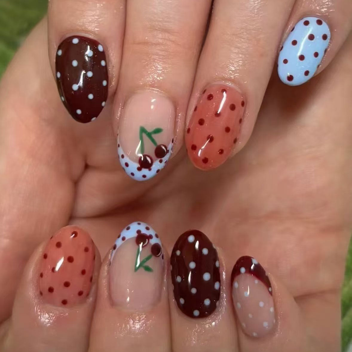 Cherry Blossom Delight Medium Oval Press-On Nail Set in Rich Brown Soft Blue and Whimsical Polka Dots