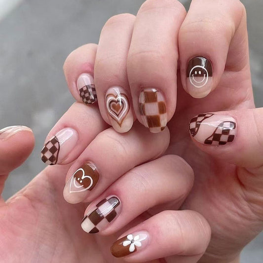 Chocolate Delight Medium Oval Brown Patterned Press-On Nail Set with Heart and Flower Accents