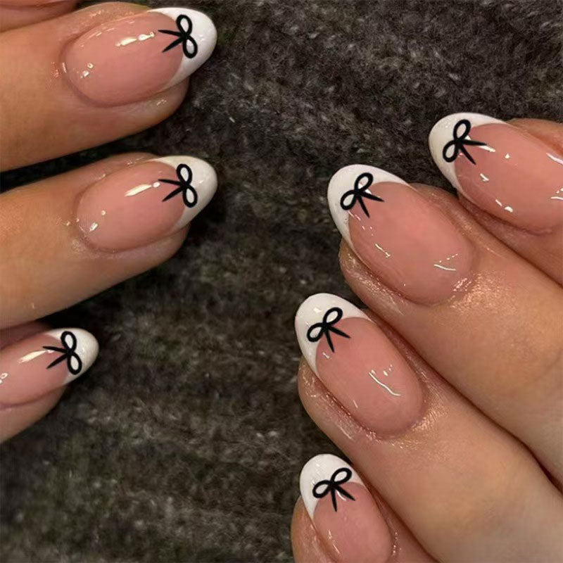 Charming Ribbon Fantasy Medium Oval Clear Pink with Black Bow Accents Press On Nail Set