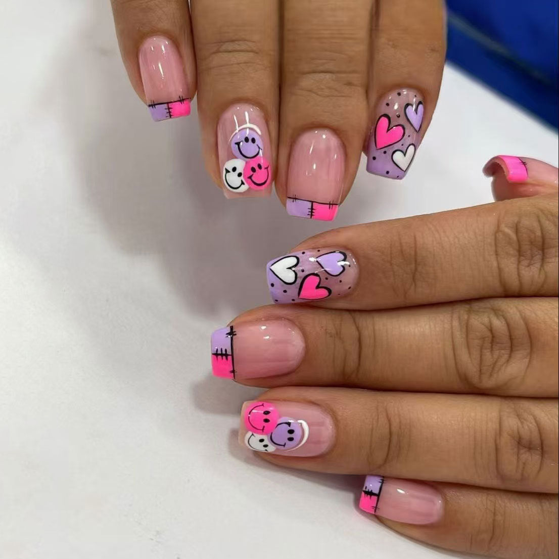 Whimsical Wonderland Short Square Lavender Press On Nail Set Featuring Colorful Heart and Smile Designs