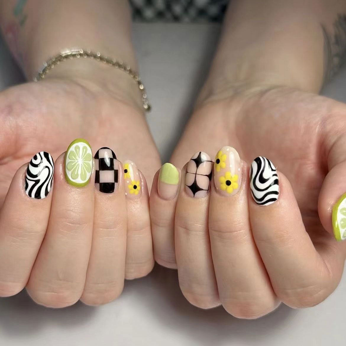 Vibrant Garden Short Oval Green and Black Colorful Patterned Press On Nail Set