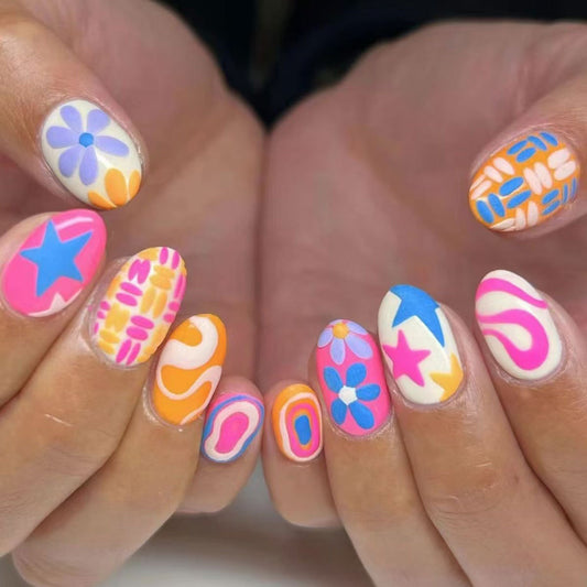 Groovy Summer Vibes Short Oval Pink and Orange Colorful Press On Nail Set with Unique Flower and Star Designs