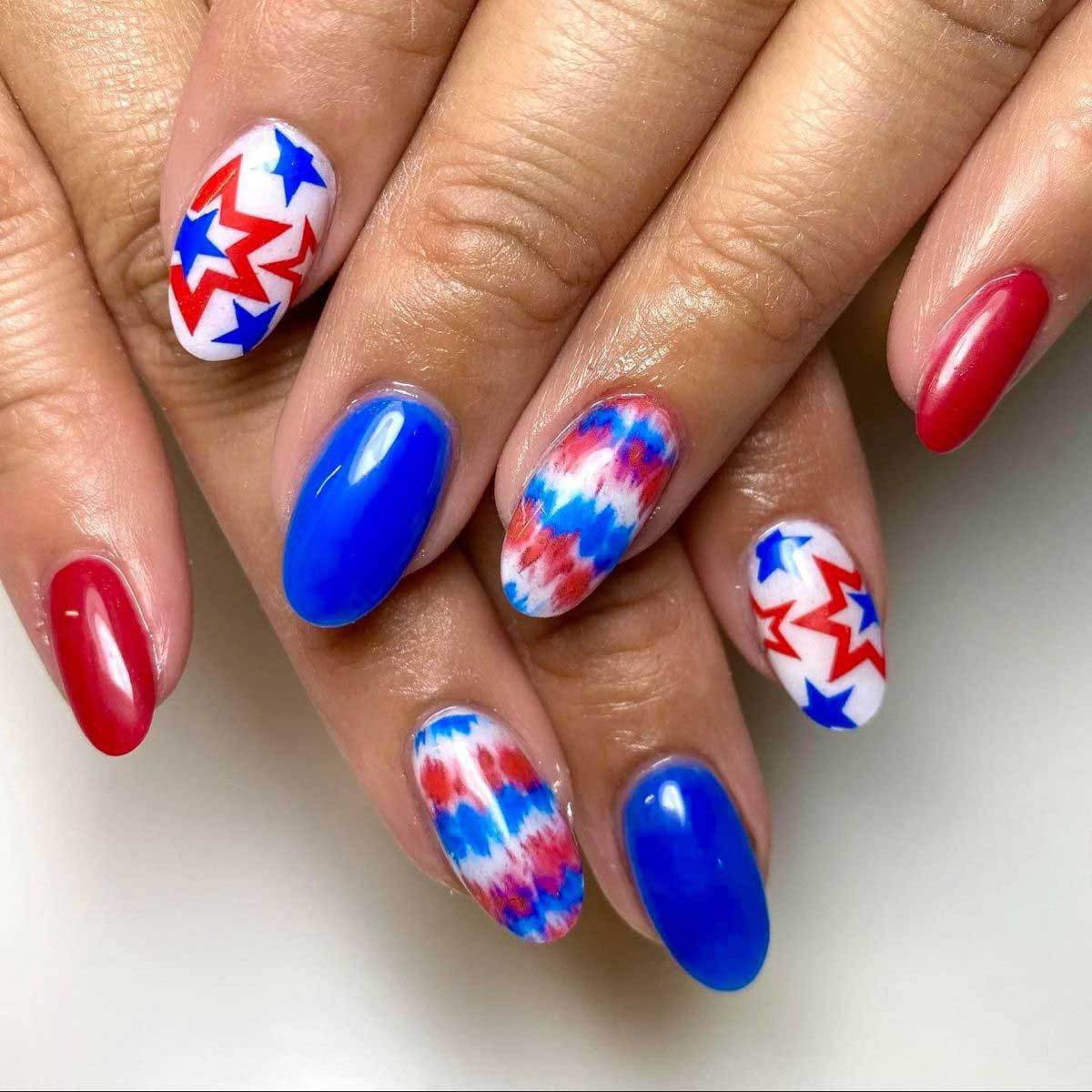 Festive Celebration Medium Oval Blue with Striking Star Patterns Press on Nail Set