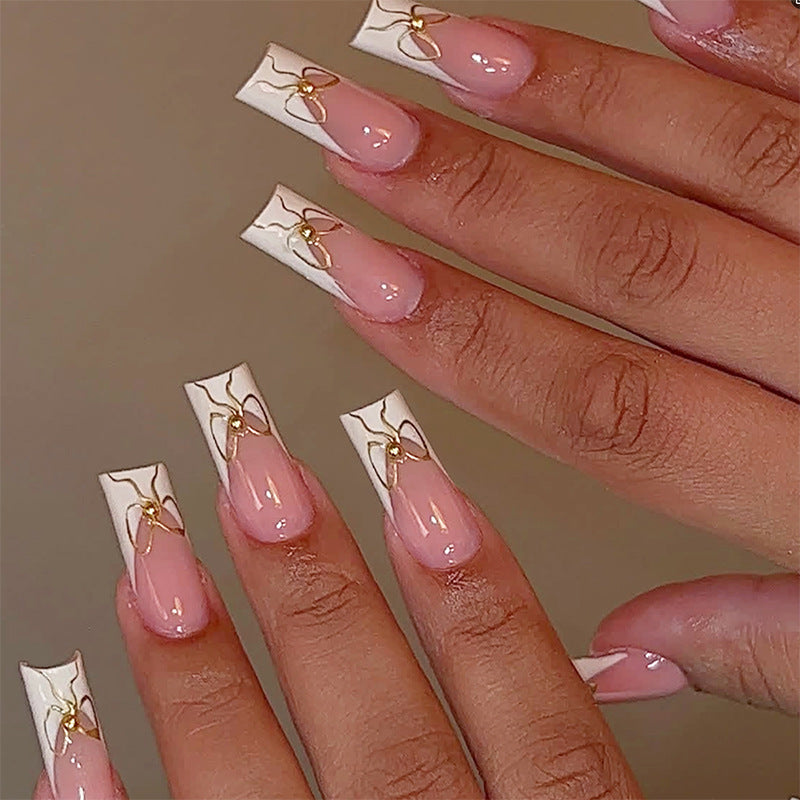 Chic Elegance Medium Square Pink and White Press On Nail Set with Unique Gold Bow Detail