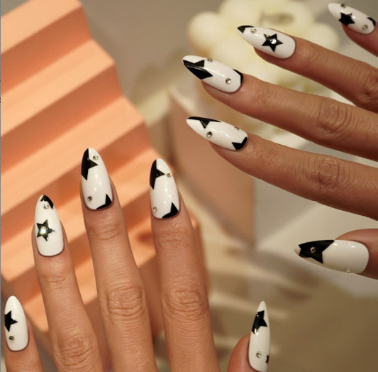 Celestial Glam Press On Nail Set Long Almond Shape Glossy White with Black Stars and Sparkling Gems