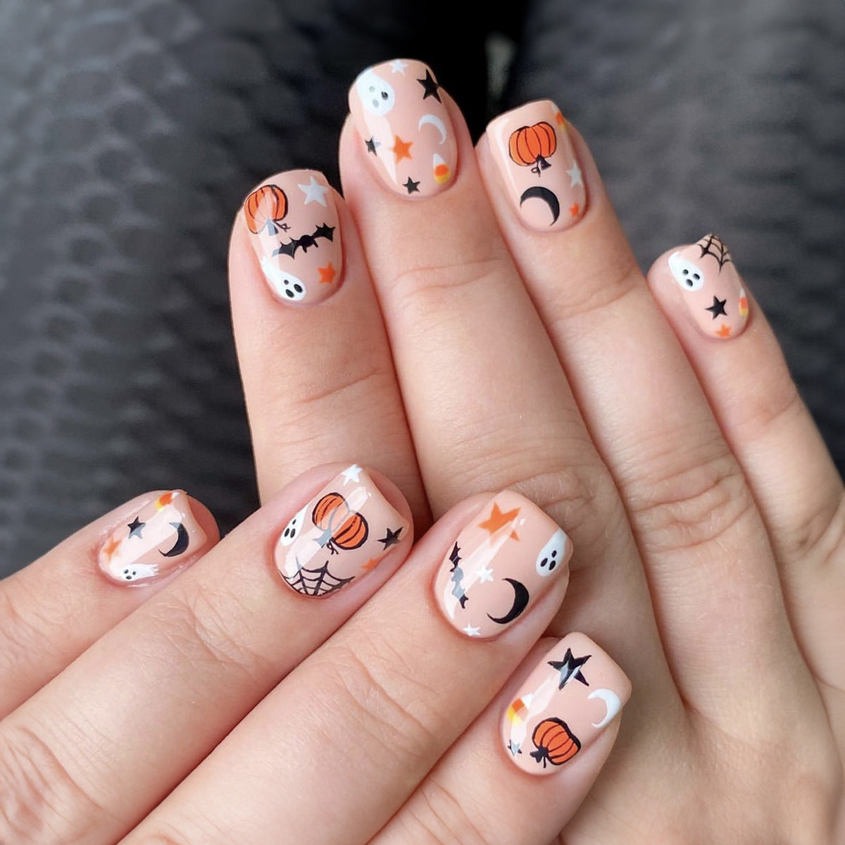 Spooky Chic Medium Oval Peach Press On Nails with Halloween Motif Design