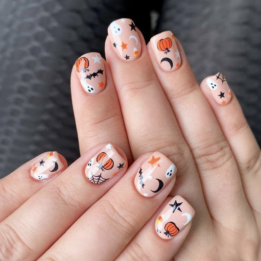 Spooky Chic Medium Oval Peach Press On Nails with Halloween Motif Design