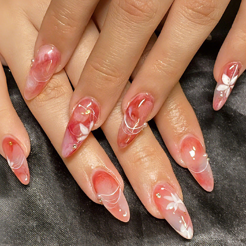 Enchanting Blossom Inspired Long Almond Pink Nails with Floral Accents and Stunning Gold Details