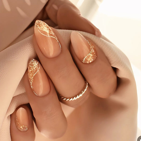 Gilded Elegance Press On Nail Set Short Almond Shaped Soft Peach Color Sparkling Glitter Design