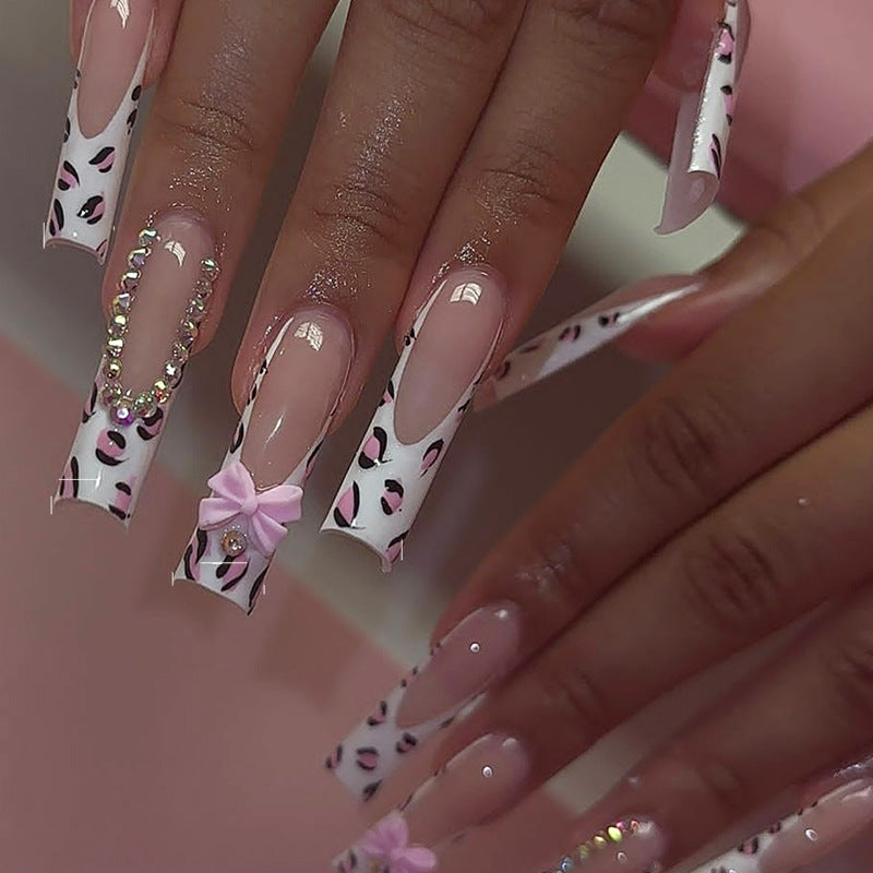 Chic Leopard Fantasy Long Square White and Pink Nail Set with Bow and Rhinestone Accents