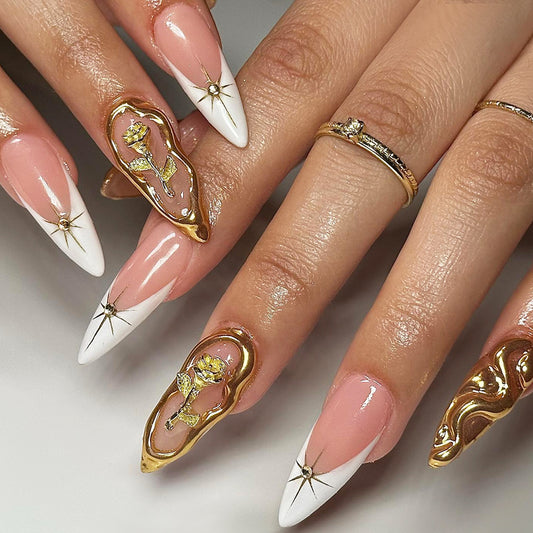 Elegant Floral Fantasy Long Stiletto Press On Nail Set in Soft Pink and Crisp White with Luxurious Gold Accents and Artistic Floral Design