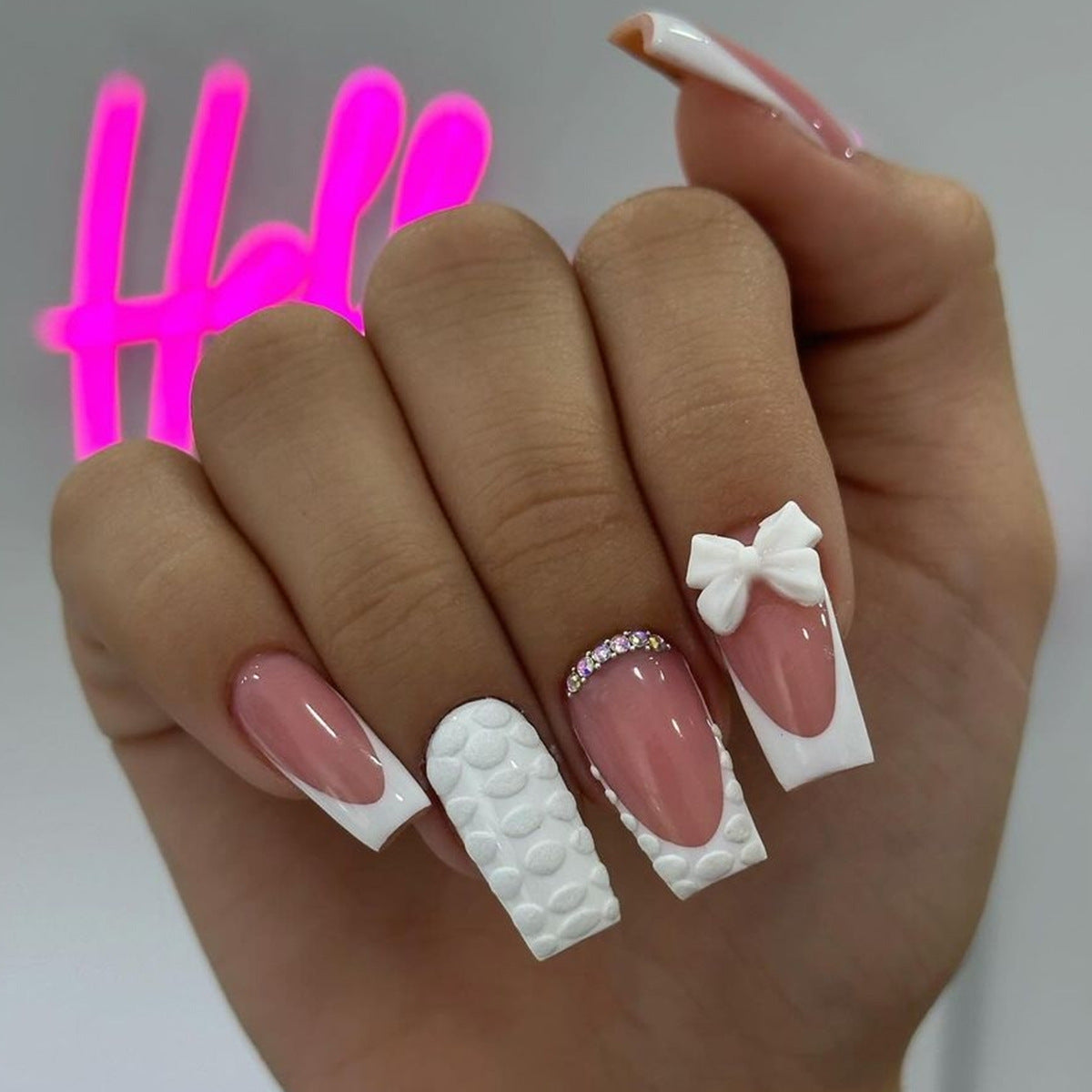 Chic Elegance Medium Square Pink White Nails with Textured Finish and Bow Accent