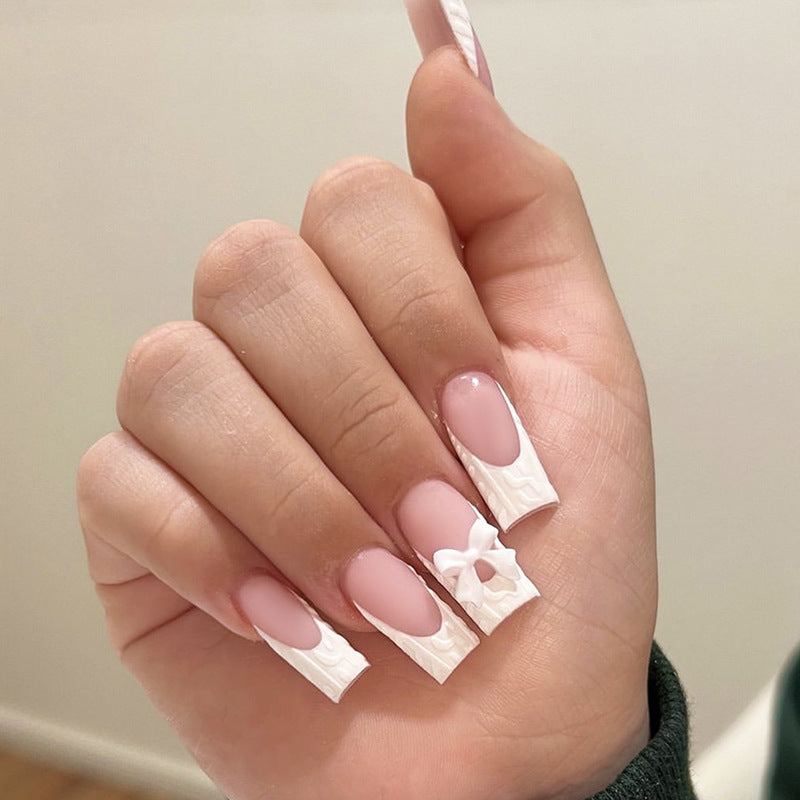 Elegant Winter Wonderland Medium Square White Nail Set with Charming Bow Accent and Textured Detail