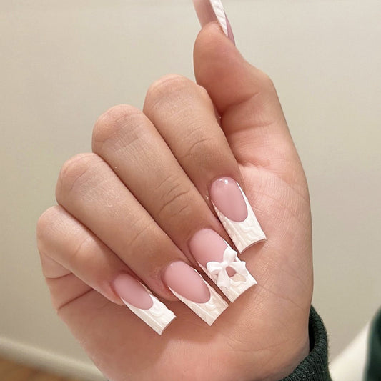 Elegant Winter Wonderland Medium Square White Nail Set with Charming Bow Accent and Textured Detail