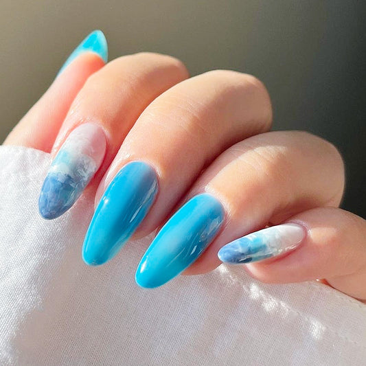 Oceanic Serenity Long Almond Sky Blue Press On Nails with Marble Accent Feature