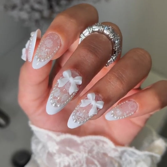 Bridal Elegance Long Almond White Press On Nail Set with Bow Accents and Rhinestone Embellishments