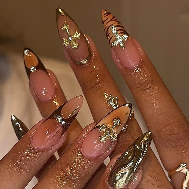 Safari Glamour Long Almond Nails in Warm Tones with Glittering Accents