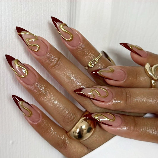 Flame Inspired Long Stiletto Shaped Burgundy and Beige Press on Nail Set with Gold Swirl Detailing