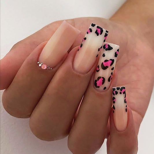 Wild Elegance Long Square Peach Nails with Chic Leopard Print and Gem Accents