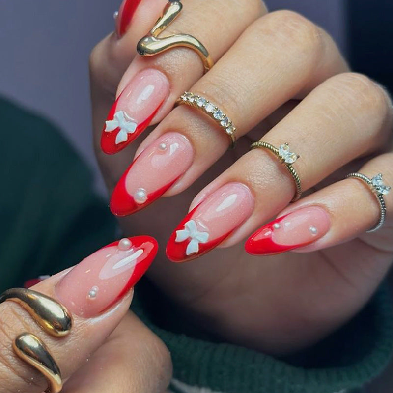 Chic Romance Medium Almond Red Ombre Nails with Elegant Bow and Pearl Accents