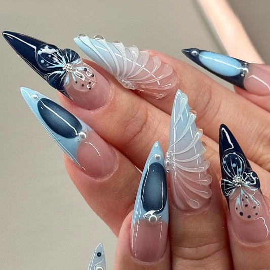 Enchanting Ocean Fantasy Long Stiletto Blue Ombre Nails with Elegant Floral Accents and Artistic Swirls