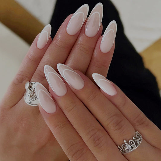 Elegant Dreamscape Long Almond Shaped Soft Pink Press On Nail Set with Unique White Accent Design