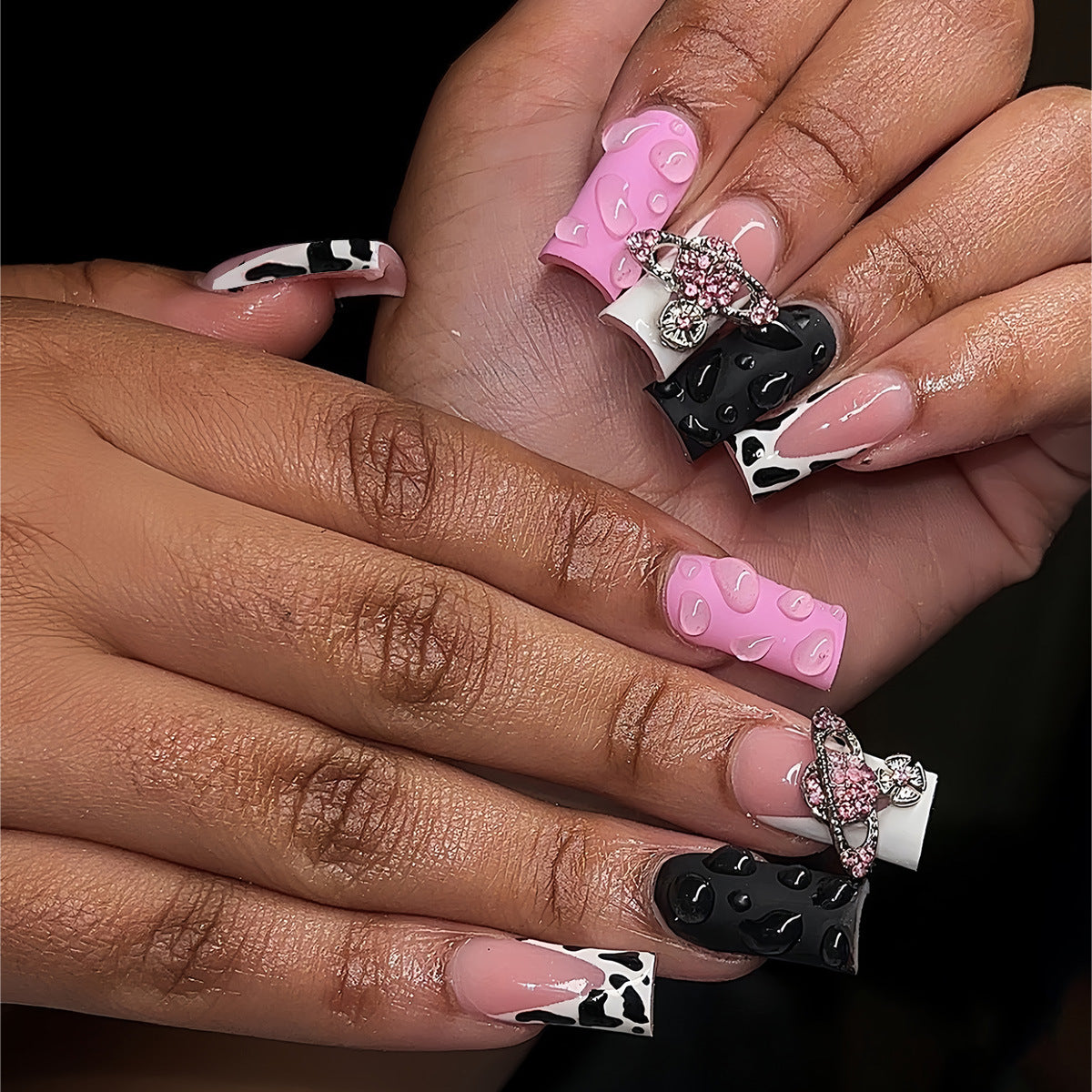 Cowgirl Chic Medium Square Pink and Black Nails with Dazzling Cow Print Accent