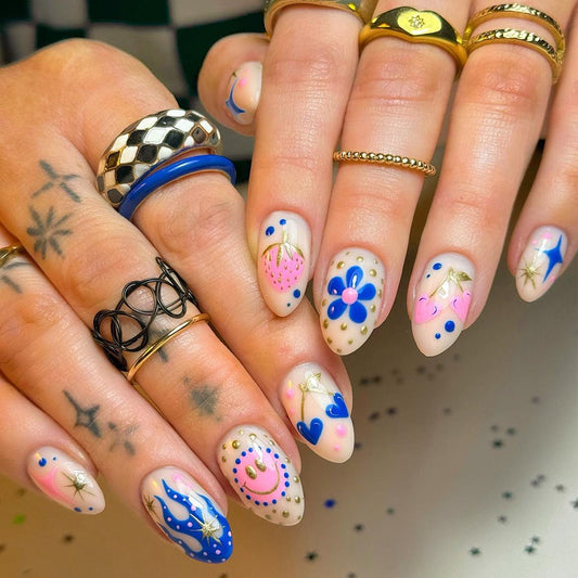 Celestial Dream Press On Nail Set Short Almond Shape Beige Base with Colorful Artistic Designs and Decorative Accents