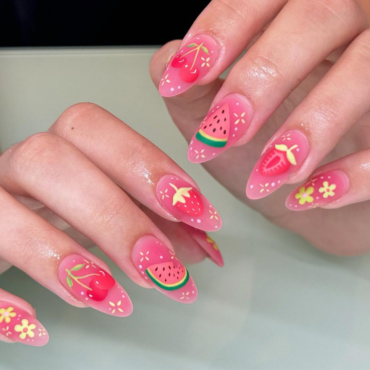 Tropical Paradise Press On Nail Set with Short Almond Shape in Bright Pink Featuring Whimsical Fruit Designs